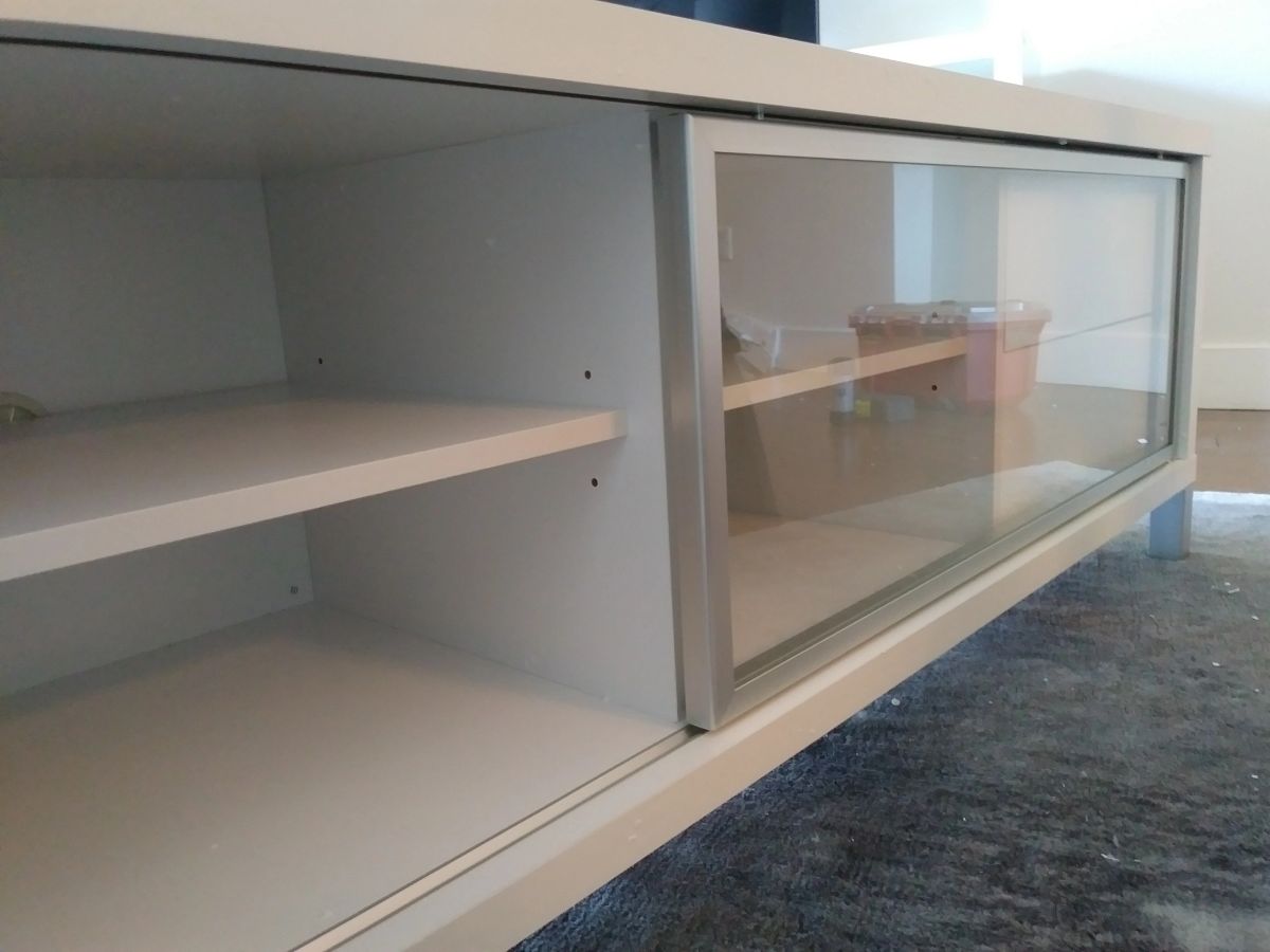 TV bench with a sliding door